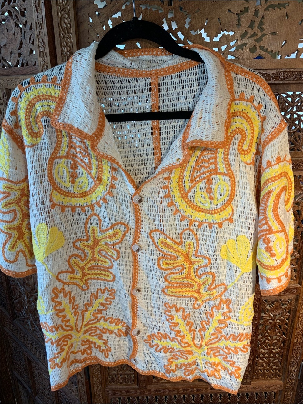 Crocheted Button-Up Cardigan in White with Orange & Yellow Floral Motif